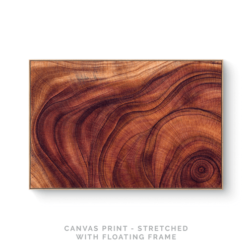 a piece of wood with a swirl pattern on it