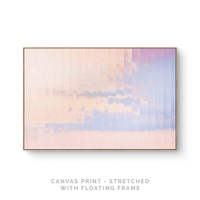 a pink and blue painting hanging on a wall